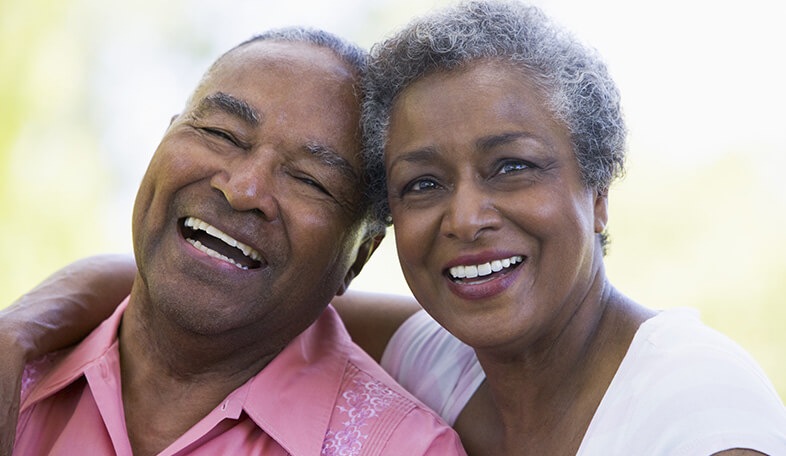 senior couple smiling