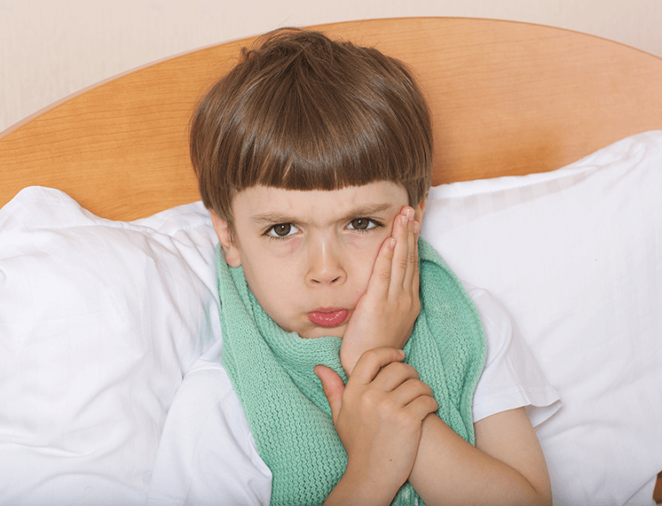 sad boy with cavity
