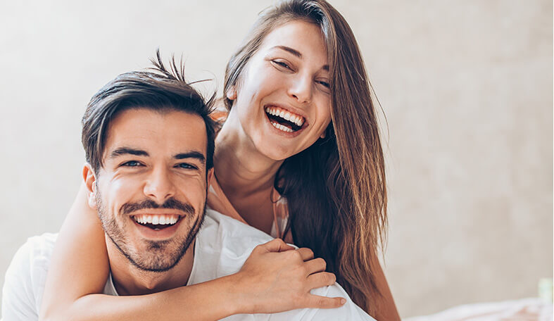 woman laughing with man