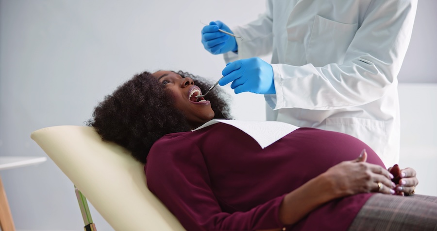 pregnant woman at the dentist, pregnancy and dental