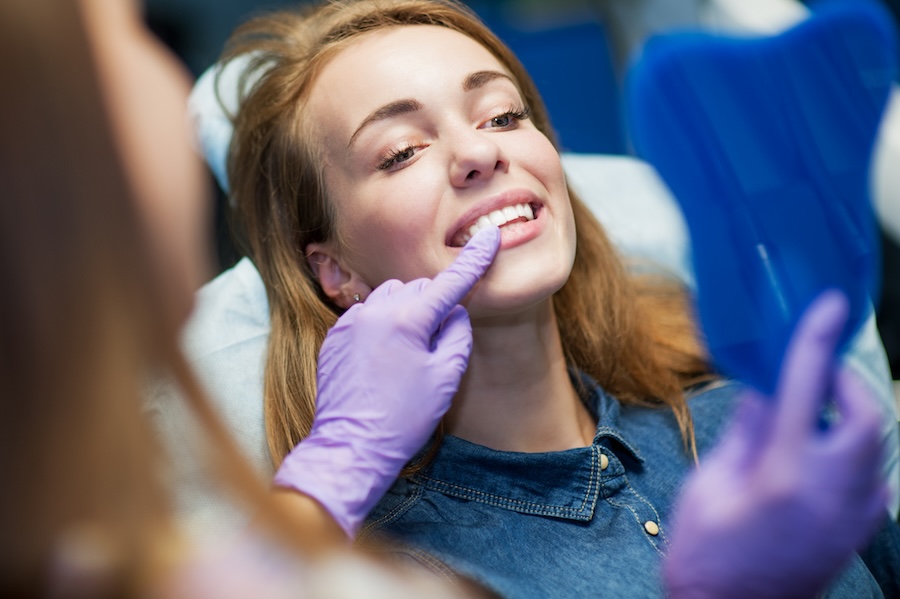 woman discussing craze lines on teeth at the dentist